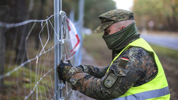 SLC - Zaun Bild1 Warnweste